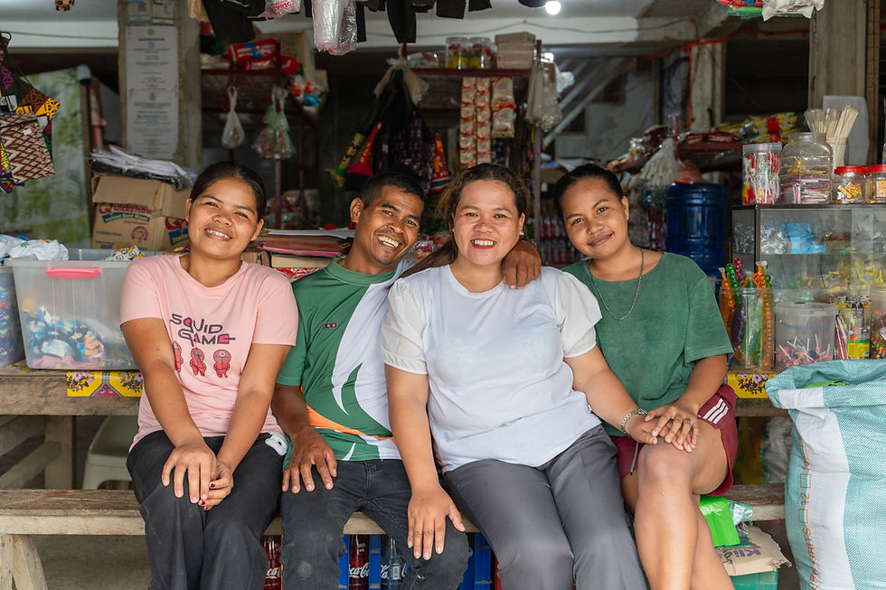 A revitalized mom-and-pop store in Sitio Kiman-anao. After their sitio was connected to the grid, husband and wife tandem Boyet and Mary Jane Sampiano (center) upgraded their variety store with a refrigerator, piso Wi-Fi, and a printing and photocopying machine, effectively increasing their daily income.